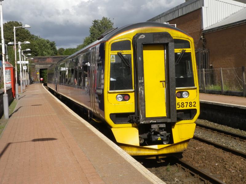Maryhill Station: A Class 158 saunters into Maryhill Station, Glasgow on a warm Saturday afternoon in August 2011. Photo of Maryhill Station