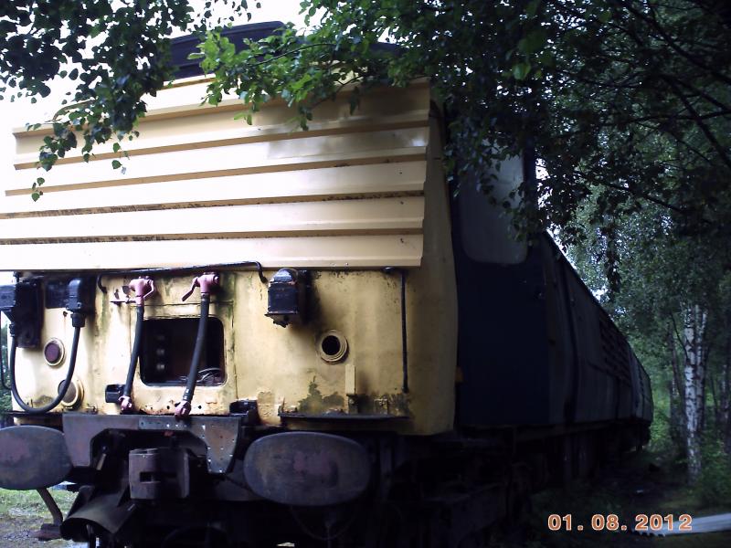 inside 311103.: workers check inside 311103's cab to check the condition of the train. Photo of inside 311103.