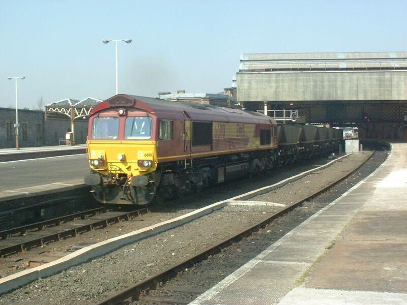 66110 MGR at Perth:
66110 departs Perth on a Longannet bound MGR during trials running via Perth Yard to avoid the Forth Bridge and therefore run longer trains Photo of 66110 MGR at Perth