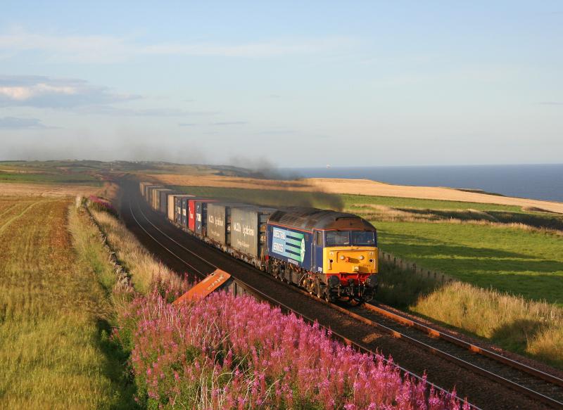 57011 4N83 190810 Limpet Mill:
57011 with her characteristic twin black clag pouring out passes Limpet Mill working 4N83 Aberdeen to Grangemouth intermodal on 19th August 2010 Photo of 57011 4N83 190810 Limpet Mill