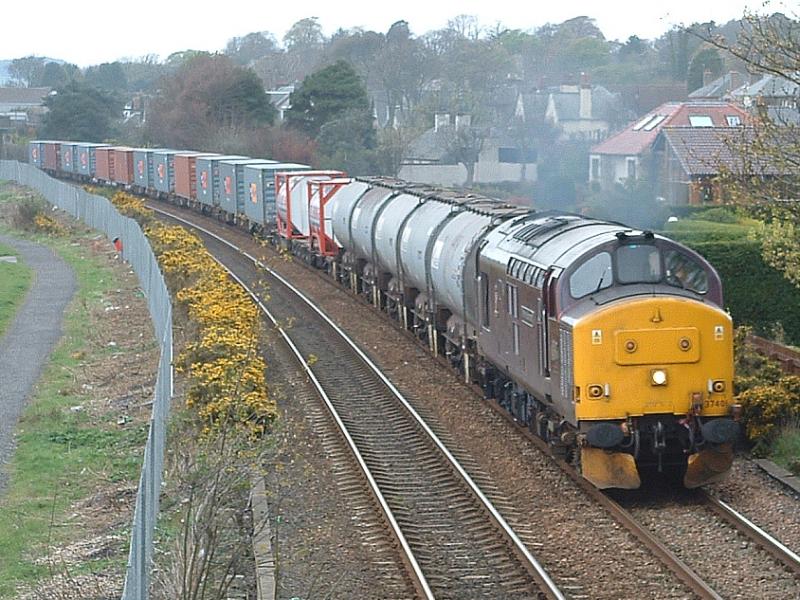 37401 6A30 Balmossie :
IIRC I was well spent after this working, not only was there Roy worthy boxes aplenty but 37401 was working very hard to move the mixed load! Photo of 37401 6A30 Balmossie