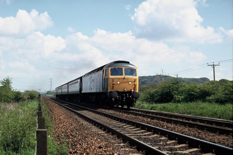 47705 at Camps junction: 47705 passes Camps junction with the Edinburgh portion that would join the Glasgow-Manchester at Carstairs Photo of 47705 at Camps junction