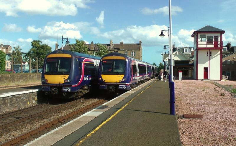Barbie 170s on Broughty Ferry stoppers:
170456 and 170420 pass each other while calling at Broughty Ferry on 28/08/12 Photo of Barbie 170s on Broughty Ferry stoppers
