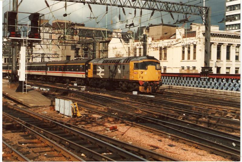 26038 at Glasgow Central: 26038 on an empty stock working from Glasgow Central to Polmadie on a summer saturday in the 1980's Photo of 26038 at Glasgow Central