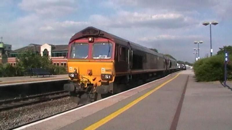 Motor Train Rumbles Past: A Car + Van Train Led By 2 EWS Liveried 66s Pass Maidenhead Photo of Motor Train Rumbles Past