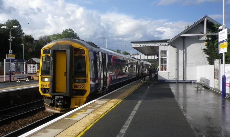 Inverkeithing: A class 158 departs Inverkeithing during a sunny interval following an August 2012 shower. Photo of Inverkeithing