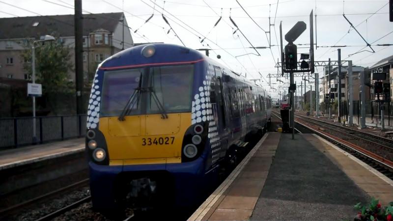 334 027: Spotty 334 027 in it's 15 day's old Saltire livery arriving at Haymarket on 15th September 2012 Photo of 334 027