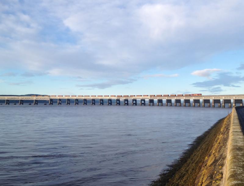66221 6S04 384 pipes cross the Tay Bridge: Photo of 66221 6S04 384 pipes cross the Tay Bridge
