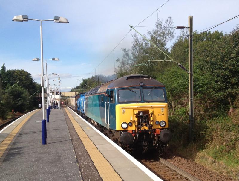 57314 on 6Z53 Yoker to Kilmarnock 334031 EMU move passing Garscadden: Photo of 57314 on 6Z53 Yoker to Kilmarnock 334031 EMU move passing Garscadden
