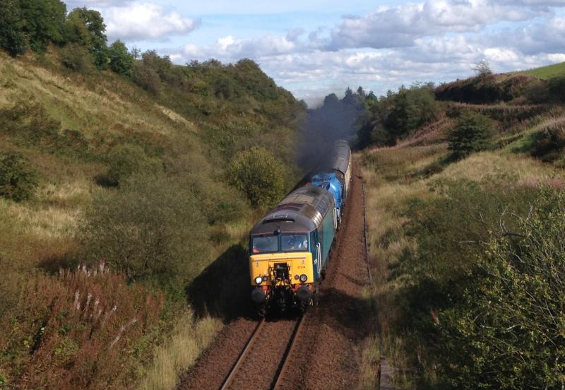 57314 6Z53 Yoker to Kilmarnock 334031 EMU move climbing Shillford bank: Photo of 57314 6Z53 Yoker to Kilmarnock 334031 EMU move climbing Shillford bank