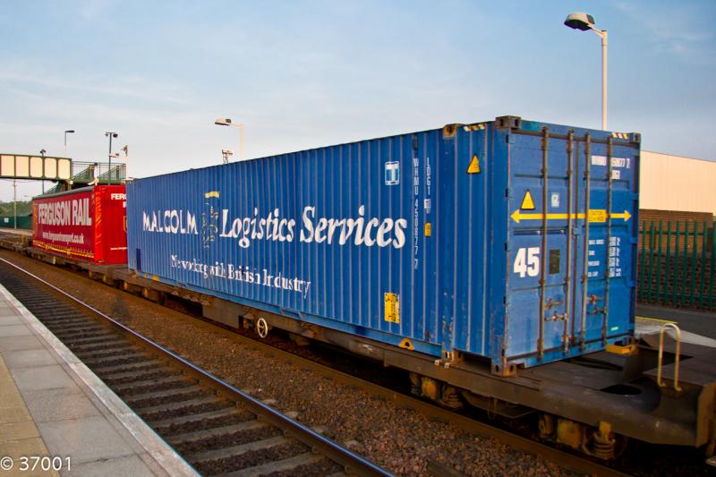 Ferguson Rail container on 4M30: Now a regular sight each evening on 4M30 Grangemouth - Daventry are Ferguson Rail containers, seen here at Camelon in May 2012 alongside a Malcolms container Photo of Ferguson Rail container on 4M30