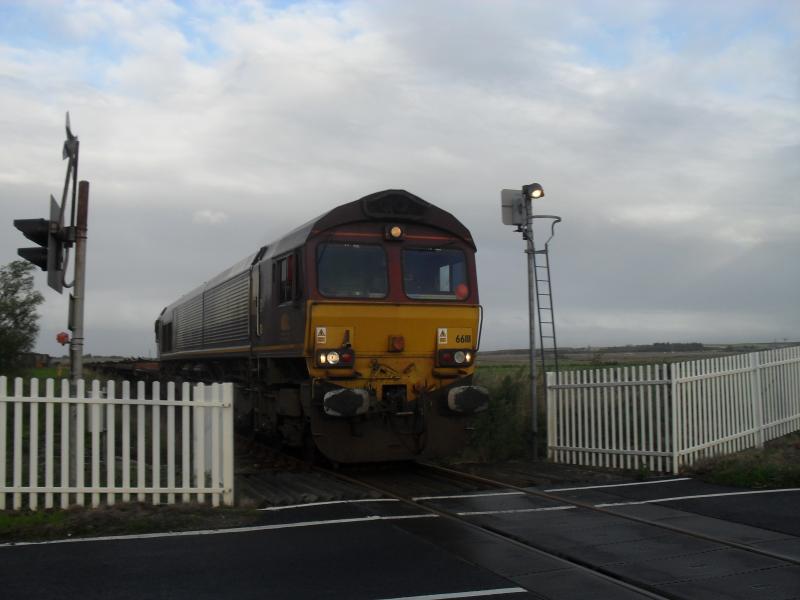 6E69: 6E69 Carrying empties from Georgemas junction to Hartlepool seen near Georgemas. Photo of 6E69