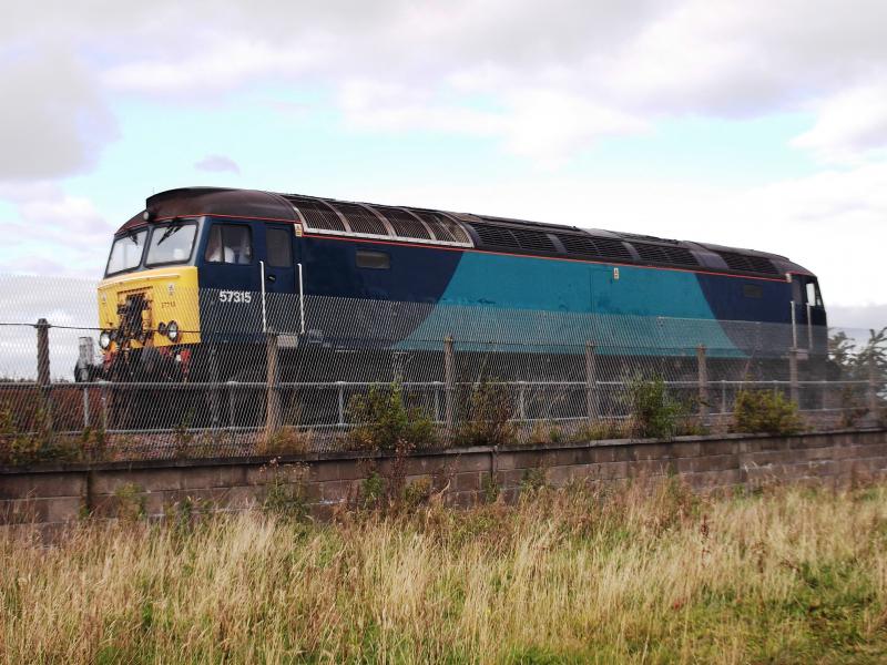 57315 on 0T62 Grangemouth to Motherwell: 57315 on 0T62 Grangemouth to Motherwell route learner. See waiting at Carmuirs West Junction on 5th October 2012. Photo of 57315 on 0T62 Grangemouth to Motherwell