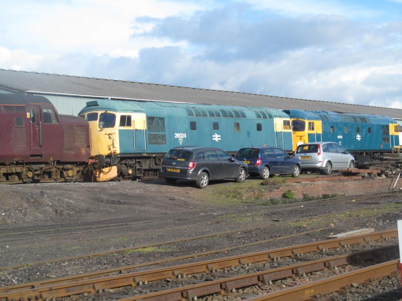 26024, 37516, 26038: 26024 is sandwiched between 26038 and West Coast 37516 in Bo'ness yard. 06/10/12 Photo of 26024, 37516, 26038