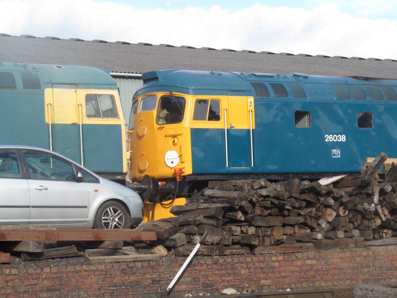 26024, 26038 and a Ford: A good picture of 26024 and 26038 but it was spoiled by a Ford. Why would you park it there anyway! 06/10/12 Photo of 26024, 26038 and a Ford
