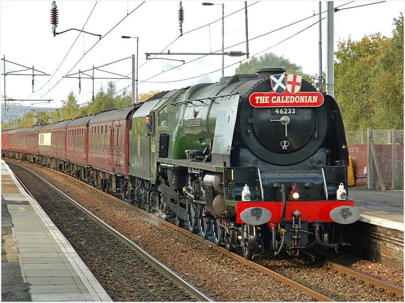 46233 'Duchess of Sutherland' at Coatbridge Central: 46233 drifts through Coatbridge Central 30 minutes down on 6 October with the return leg of 'The Caledonian' from Stirling Photo of 46233 'Duchess of Sutherland' at Coatbridge Central