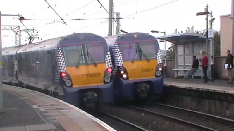 Saltires Cross: 334029 Departing On The Service To Edinburgh Waverley Crosses 334027 On A Northbound Service Photo of Saltires Cross