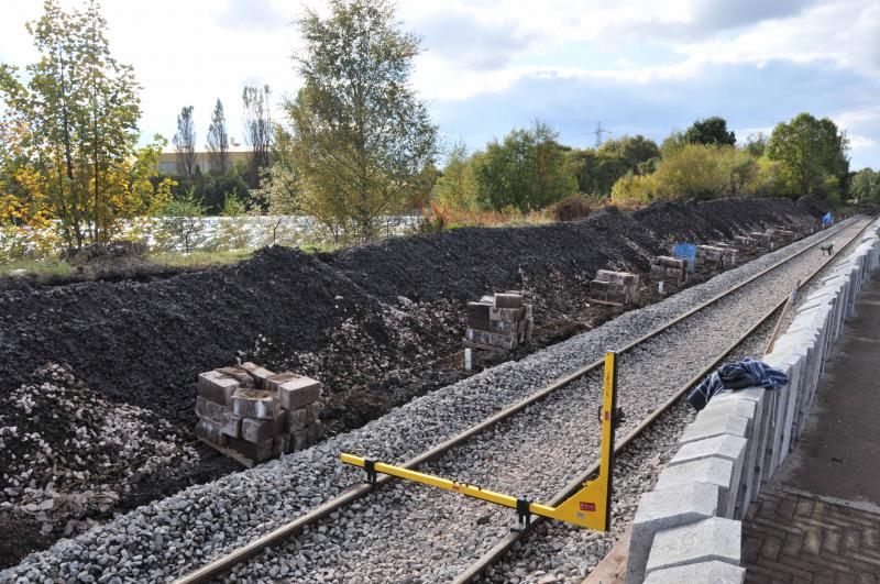 Hawhead Station: Sunday 14th Oct Hawkhead Station during the Canal Line Electrification.
The line has been lowered and a Laser is being used to give the height from Rail head to the New Platform Level Photo of Hawhead Station