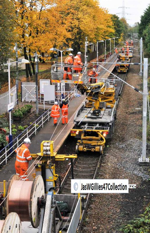 Units prepare to move under the bridge: 19th Oct 2012 Th e4 SRS Units start of prepared to fit the wires under the Low Bridge Photo of Units prepare to move under the bridge