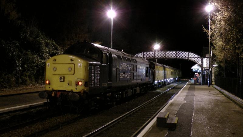 37229 Dunkeld:
37229 waits at Dunkeld & Birnam for the southbound sleeper to pass before continuing to Inverness while pushing a test train with DBSO 9703 leading Photo of 37229 Dunkeld