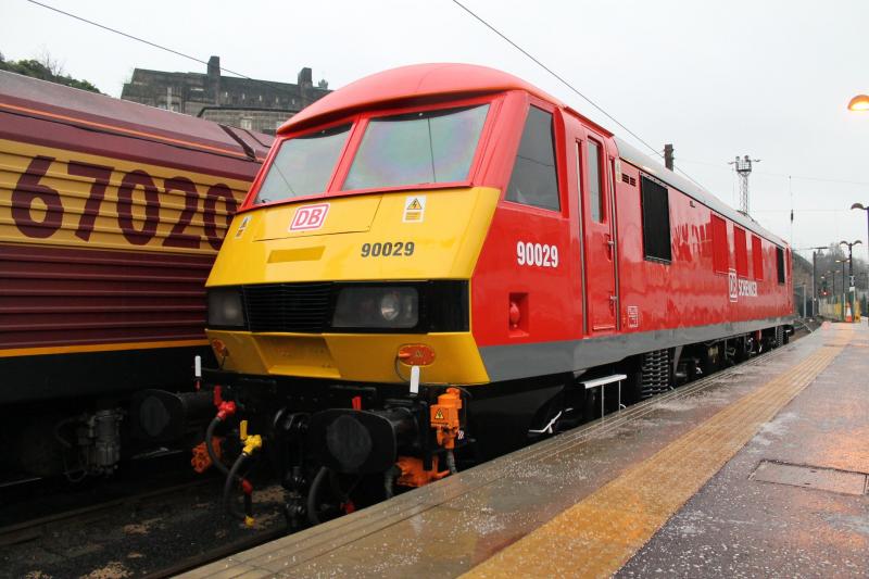DB Schenker 90029: DB Schenker in it's new colours sitting in Edinburgh Waverley motorail bay 14/12/12 having worked in on 1S25 sleeper from Euston in the early hours Photo of DB Schenker 90029