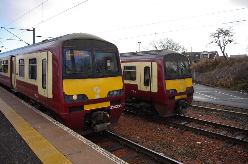 320309, 320303: 320309/02 at Airdrie. 18.12.12. Photo of 320309, 320303
