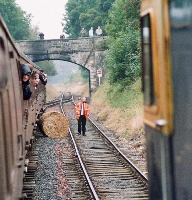 Bailing out at Birkhill: The train guard Mr McDonald needs to get his farm in order before his train can return to Bo,ness. Photo of Bailing out at Birkhill