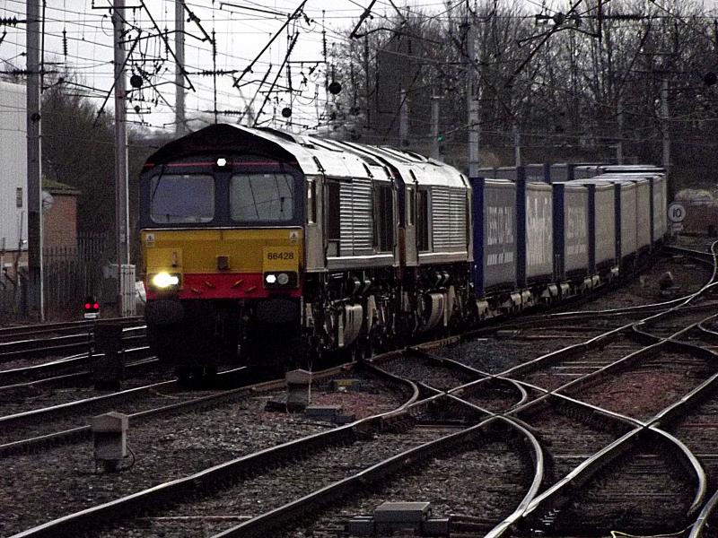 66428and66432: One of the few trains planned for a multiple working of the 66, due to the train weight is 4S43, the Tesco container service from Daventry to Mossend. Approaching Carlisle on Saturday 5th January 2013. Photo of 66428and66432