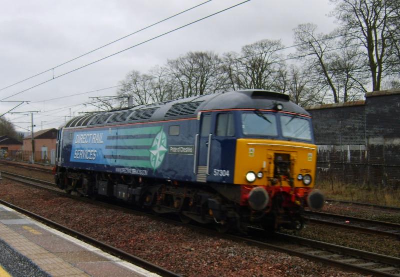 OZ57 Carstairs 9th January 2012: 57304, looking very clean after its visit to Kingmoor passes through the station on its way to Polmadie. Photo of OZ57 Carstairs 9th January 2012