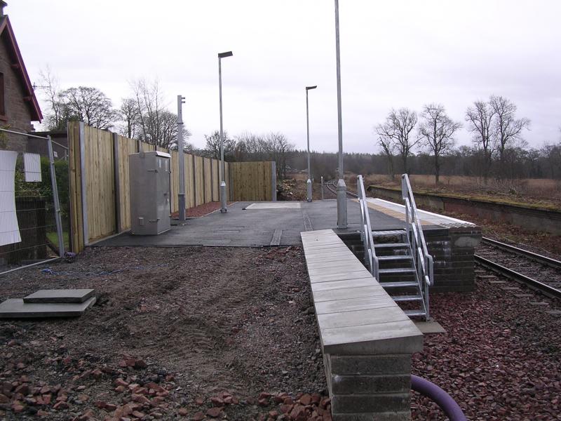Conon Bridge - New Station Construction : 6th January 2013
Close up of nearly completed Conon Bridge new station, seen through contractor's safety/security fencing Photo of Conon Bridge - New Station Construction
