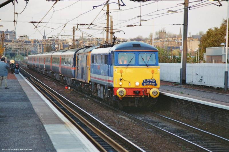 87012 & 73204 Slateford: Utilising 73204 as a barrier vehicle, 87012 leads a GNER stock move from Craigentinney to Laira through Slateford in November 2005. Photo of 87012 & 73204 Slateford