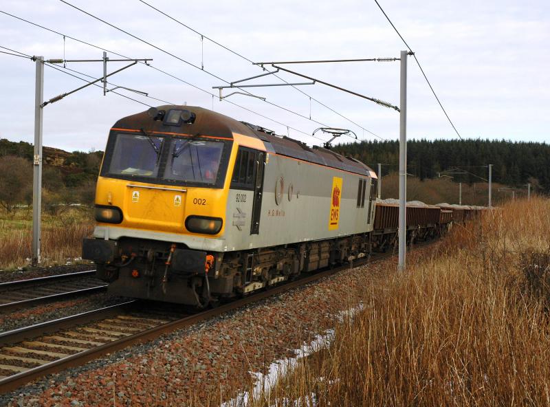 92002 Cartland: 92002 H.G. Wells brings the loaded Carlisle-Mossend ballast working north through Cartland on Friday 8th February 2013. Photo of 92002 Cartland
