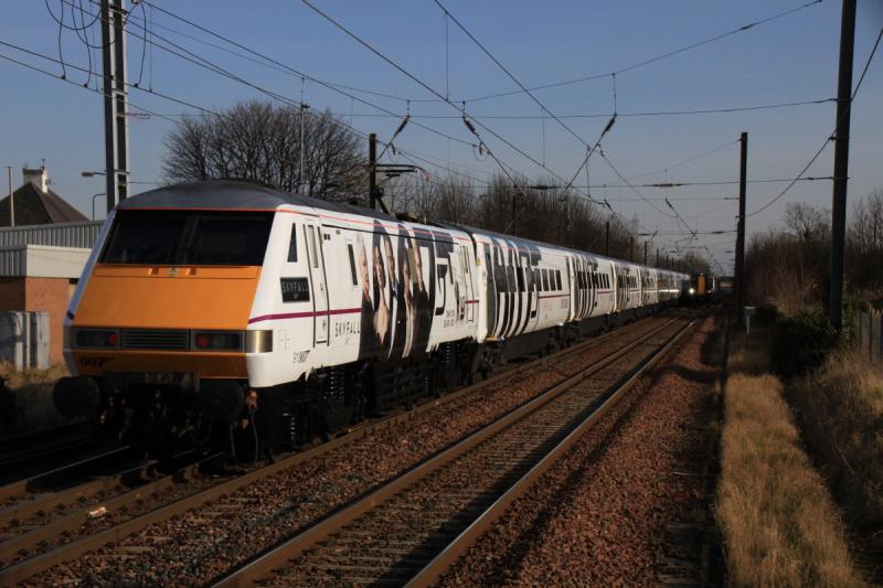 91 007 Skyfall : 91 007 Skyfall on the rear of the 11.30 Edinburgh To Kings Cross passing Prestonpans very nearly blocked by 380108 which was running a minute late on 17/02/2013 Photo of 91 007 Skyfall