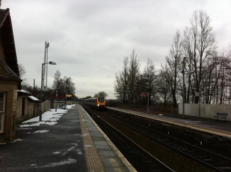 Voyager: A class 221 passes West Calder at 0754 from Polmadie to Edinburgh ECS the headcode is 5M52. Taken from my Mobile phone. Photo of Voyager