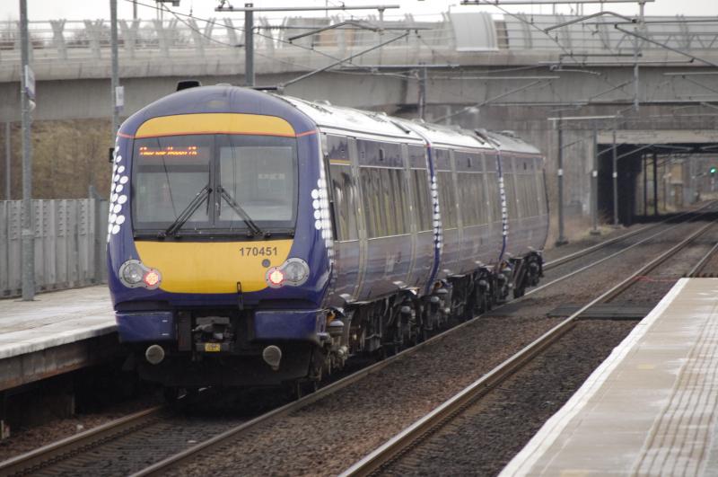 170451: 170451 passing through Edinburgh Park with an Edinburgh to Glasgow Queen Street Service. 25 March 2013. Photo of 170451