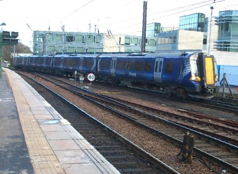 380103 at Edinburgh Waverley: ScotRail Siemens 380 Desiro 4 car set 380103 arrives at Edinburgh Waverley, with a service from North Berwick on Saturday 30th March 2013. Photo of 380103 at Edinburgh Waverley