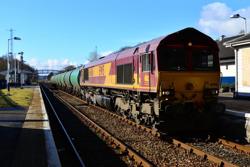 The Lairg Tanks: 66106 waits with the Lairg Tanks for a southbound passenger train to enter the loop at Dingwall Station. Photo of The Lairg Tanks