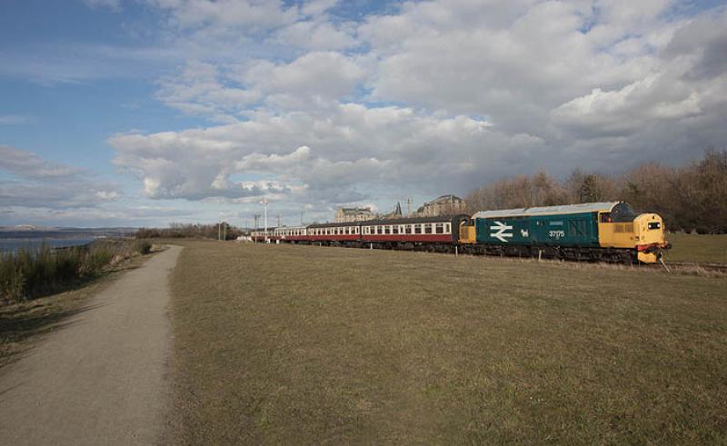 37175 at Bo'ness: 37175 WS Sellar leaves Bo'ness at 1720 on 6th April 2013. The sun was just about to disappear as the locomotive passed the camera! Photo of 37175 at Bo'ness