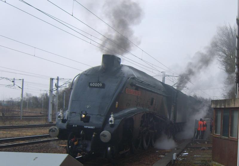 5Z94 at Carstairs today, 11th April 2013.: 60009 and 61994, hidden in the smoke, take water at Carstairs on their way to Thornton. Photo of 5Z94 at Carstairs today, 11th April 2013.