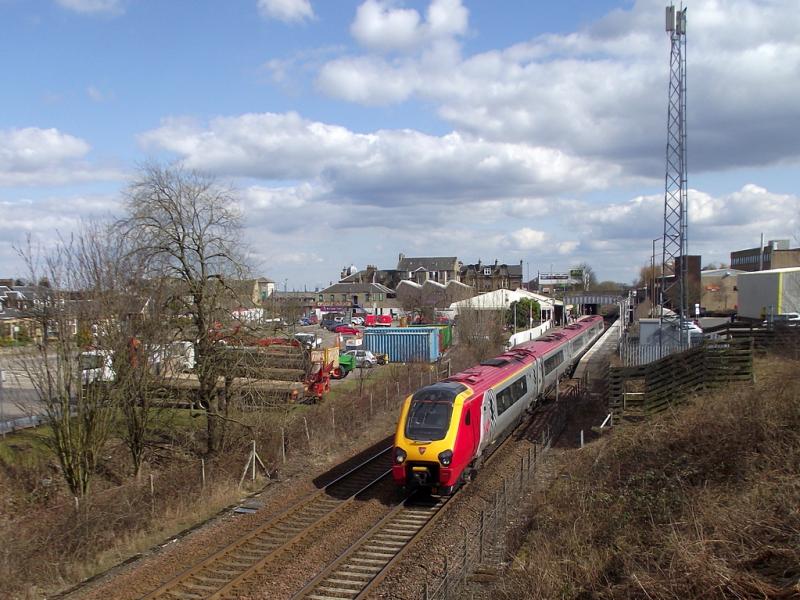 221143 at Falkirk Grahamston: On 06/04/2013, 221143 passes Falkirk Grahamston with 1M47, Virgin Trains' 13:56 Edinburgh - Carlisle, diverted via Coatbridge due to engineering work at Midcalder Jct. Photo of 221143 at Falkirk Grahamston
