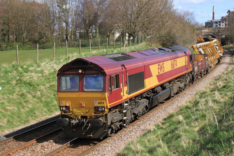 66174 with Tilting wagons: 66174 on the 11.20 Millerhill to Kingsknowe with tilting wagons loaded with pointwork passing Peffermill playing fields on 27/04/2013 Photo of 66174 with Tilting wagons
