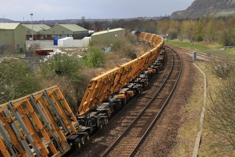 View of the Tilting wagons on 6X13: 66174 topn tail with 66102 on 6X13 11.00 Craiglockart to Carlisle NY approaching Niddrie West Jct on 28/04/2013 looks like they are leaning into the curve Photo of View of the Tilting wagons on 6X13