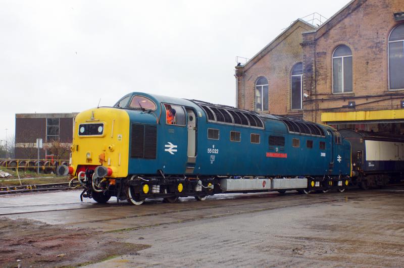 55022: 55022 waits outside No 4 road after shunting 318260 inside after arrival at the works on the 3rd
Photo with permission of both Railcare and Martin Walker Photo of 55022