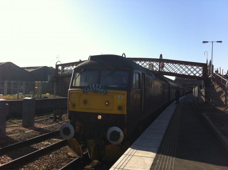 47854: Here's a picture of the train at Perth on it's way to Kyle of Lochalsh. The train stopped for a walk around the station and also 47786 Roy Castle OBE was at rear. Taken from an iPhone Photo of 47854