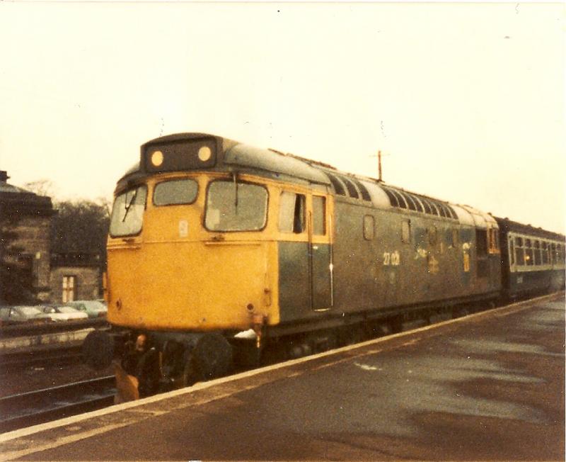 27021: 27021 stands at Kirkcaldy on January 24th 1985 with the 15.18 Edinburgh-Dundee service.Taken on my Kodak Disc camera which I got for Christmas 1984. Photo of 27021