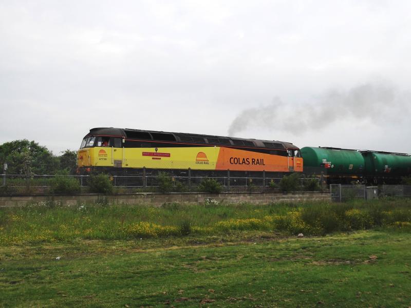 47739 on 6R46 Grangemouth to Prestwick tanks: 47739 Robin of Temblecombe works the 6R46 Grangemouth to Prestwick oil tanks on 21st June 2013. Seen passing Carmuirs West at 0655. Photo of 47739 on 6R46 Grangemouth to Prestwick tanks