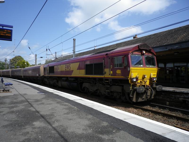 Kilwinning: May 2011: A class 66 sweeps through the station en route to Hunterston Photo of Kilwinning: May 2011