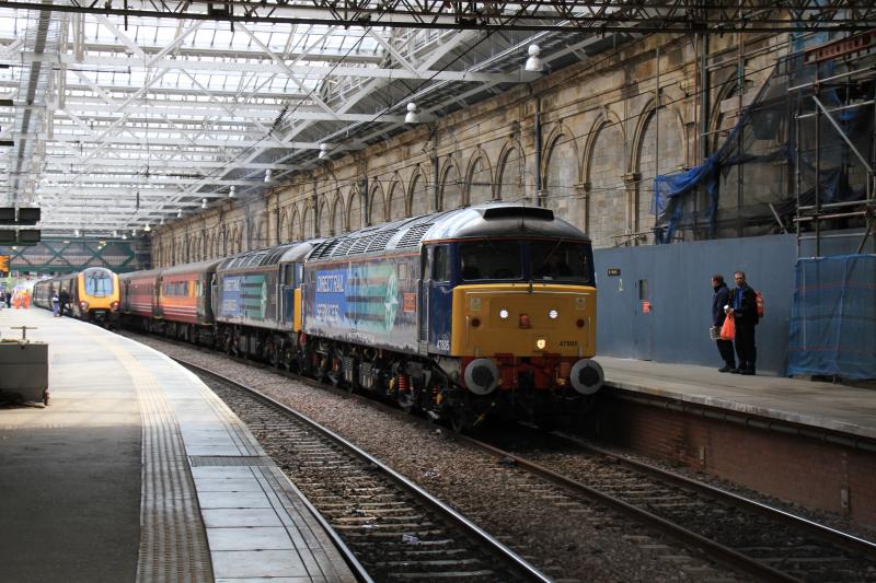 1Z42: 47805 + 47501 on 1Z42 06.42 York to Aviemore in platform 10 Waverley on 26/06/2013. The staff on platform 11 were looking at the rear of the train blocked the crossover for the Voyager to leave, a class 334 was in pl 7 Photo of 1Z42