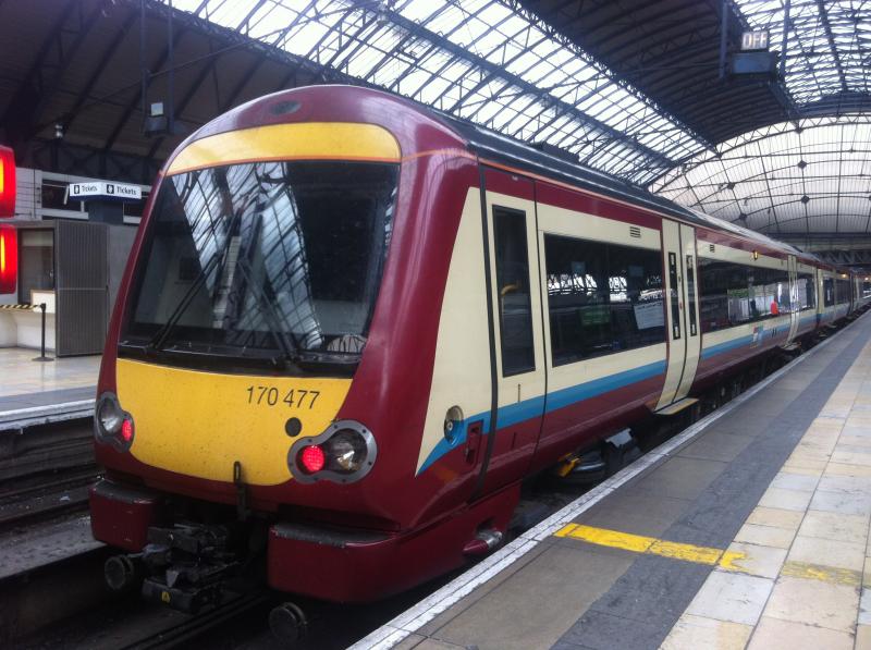 SPT Liveried 170477: Still SPT Liveried 170477 stands at Glasgow Queen Street Photo of SPT Liveried 170477