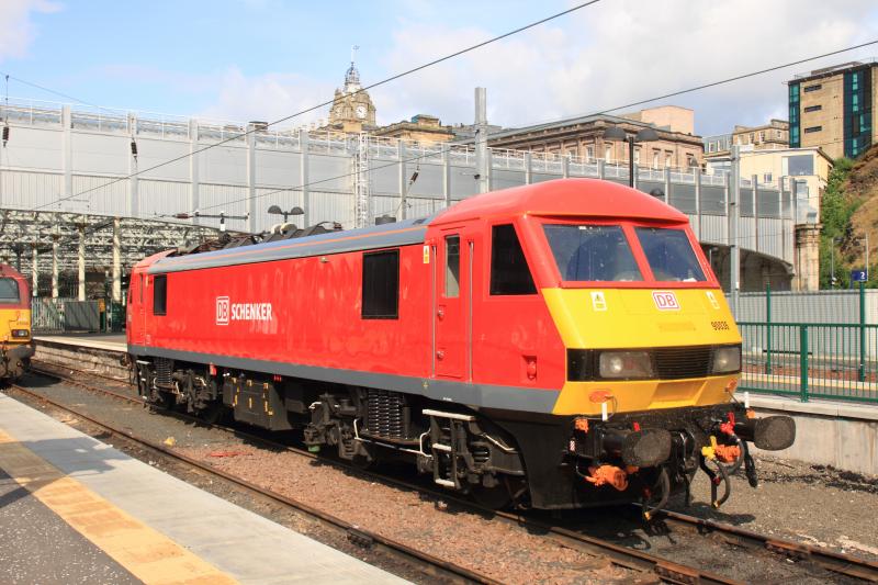 Dayglo 90036: 90036 looking cleaner in DB Schenker livery in the old Motorail bay in Edinburgh Waverley on 05/07/2013 Photo of Dayglo 90036